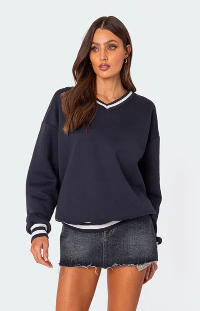 EDIKTED WOMEN'S CARYN OVERSIZED V NECK SWEATSHIRT IN BLUE