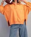 Eesome Snow Washed Long Sleeve Pull Over In Orange In Orange