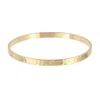 Eklexic Women's Hammered Bangle Bracelet In Gold In Gold