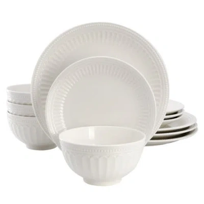 Elama 12 Piece Stoneware Dinnerware Set In White