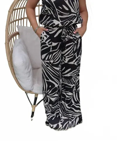 Elan Rio Strapless Jumpsuit In Black And Off-white Tropical Print In Multi