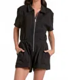 Elan Short Sleeve Collared Sweatsuit Romper In Black In Black