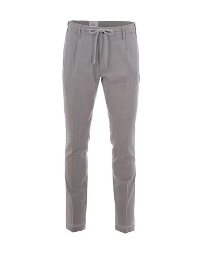 Eleventy Sleek Tailored Trousers For Men In Gray