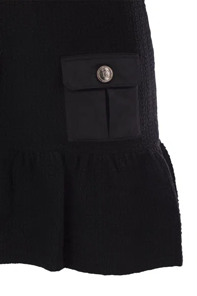 Elisabetta Franchi Bouclé Wool Miniskirt With Technical Sail Cloth Pockets In Black