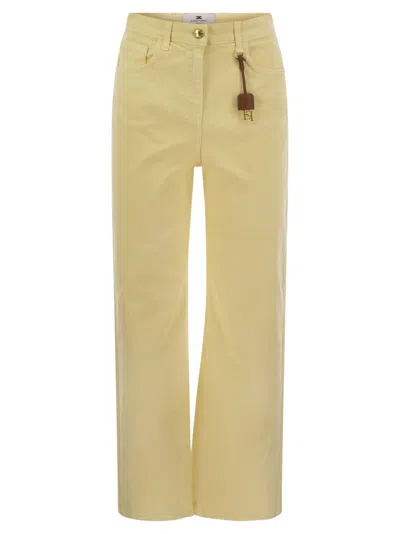 Elisabetta Franchi Dyed Cotton Jeans With Logo Charm In Yellow