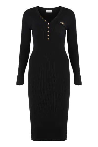 ELISABETTA FRANCHI I WEAR A RIBBED SWEATER WITH A POCKET.