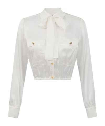 ELISABETTA FRANCHI MATCH IT WITH A SCARF AND A SHORT SHIRT