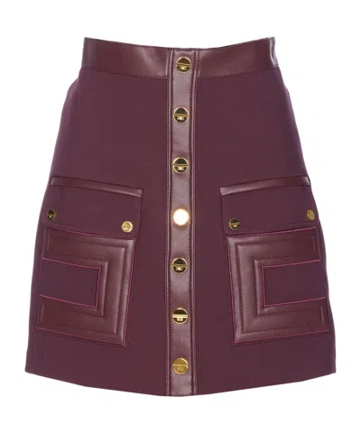 ELISABETTA FRANCHI MINI SKIRT IN DOUBLE-LAYER CRÊPE FABRIC WITH LOGO DETAILS