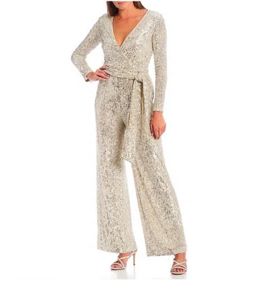Eliza J Sequin V-neck Long Sleeve Straight Leg Wrap Jumpsuit In Beige In Neutral