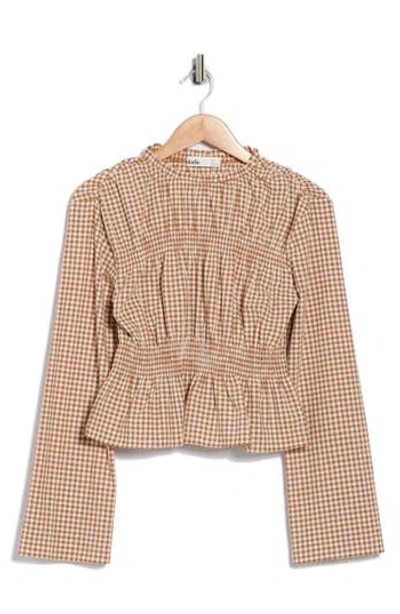 Elodie Gingham Long Sleeve Peplum Top In Brown
