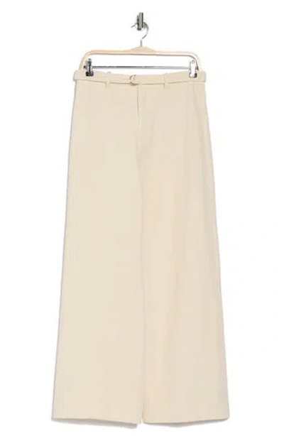Elodie Relaxed Belted Trousers In Cream