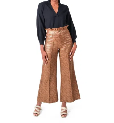 EMILY MCCARTHY RUFFLE FLARE PANT IN GOLD TWEED