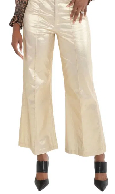 Emily Mccarthy Ruffle Flare Pant In Metallic Gold Cotton In Multi