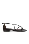 Emme Parsons String Leather Sandals In Black