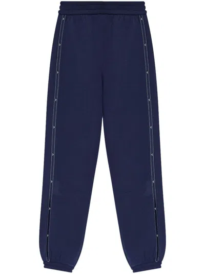 Emporio Armani Logo-detailed Stretch-cotton Track Pants In Blue