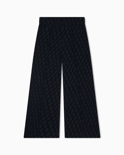 Emporio Armani Kids' Interlock Jersey Trousers With All-over Flocked Ea Logo In Black