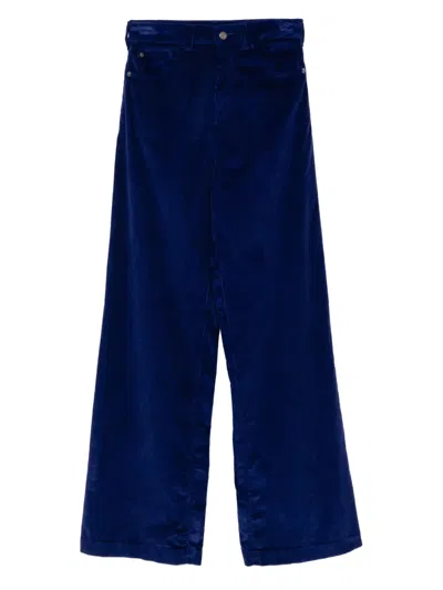 Emporio Armani J14 Trousers In Blue