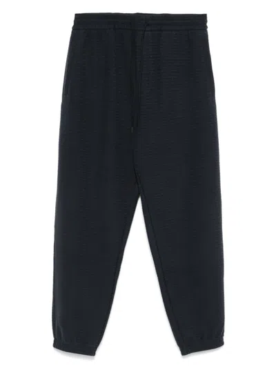 EMPORIO ARMANI NAVY BLUE LOGO JACQUARD TRACK PANTS