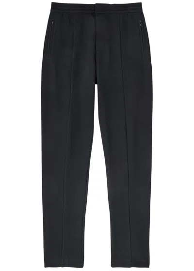 Emporio Armani Tapered Waffle-knit Cotton-blend Trousers In Navy