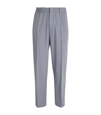 Emporio Armani Travel Essentials Trousers In Gray
