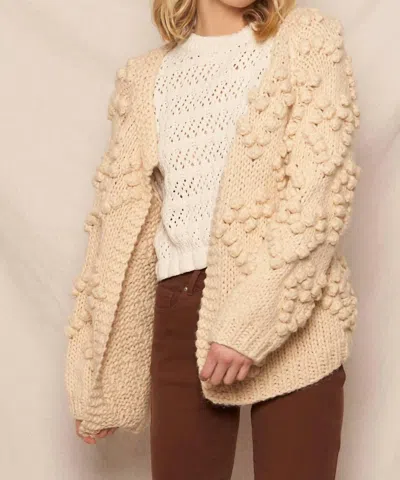 En Creme Pom Pom Cardigan In Ivory In Multi