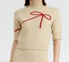En Saison Short Sleeve Bow Sweater In Beige