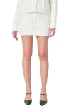 Endless Rose Cable Knit Cotton Blend Miniskirt In Cream