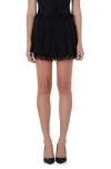Endless Rose Peekaboo Lace Trim Pleated Skort In Black