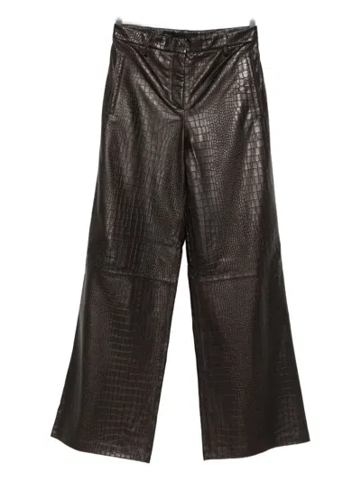 Enes Leather Trousers In Brown