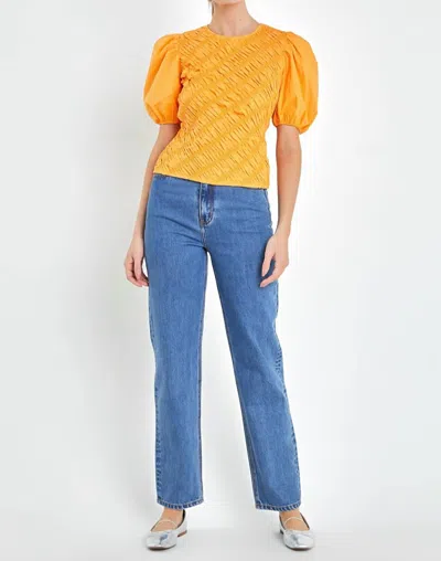 ENGLISH FACTORY ASYMMETRICAL SMOCKED TOP IN ORANGE