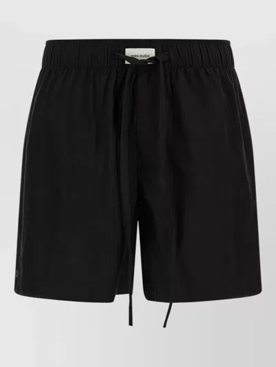 ENTIRE STUDIOS RELAXED SHORTS FEATURING A PRACTICAL BACK POCKET
