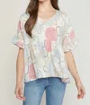 Entro Abstract Peplum Top In Cream In White
