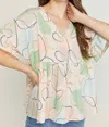Entro Abstract Peplum Top In Peach In Pink
