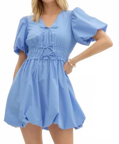 ENTRO BOW BUBBLE HEMMED MINI DRESS IN CHAMBRAY