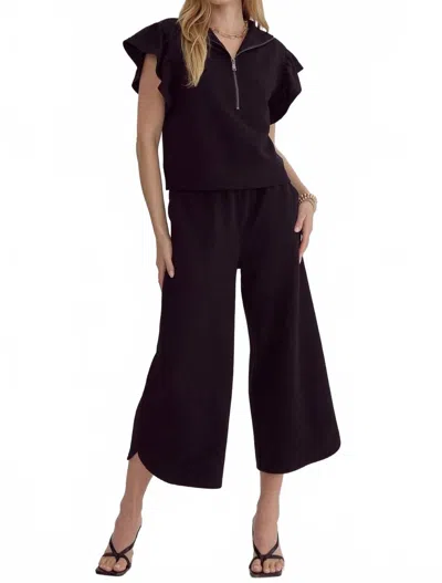 Entro Half Zip Textured Flutter Sleeve Top In Black