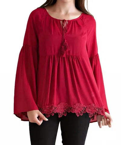 ENTRO TASSEL TIE BABYDOLL BLOUSE IN RED