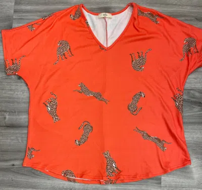 Entro Women's Cheetah Top In Orange