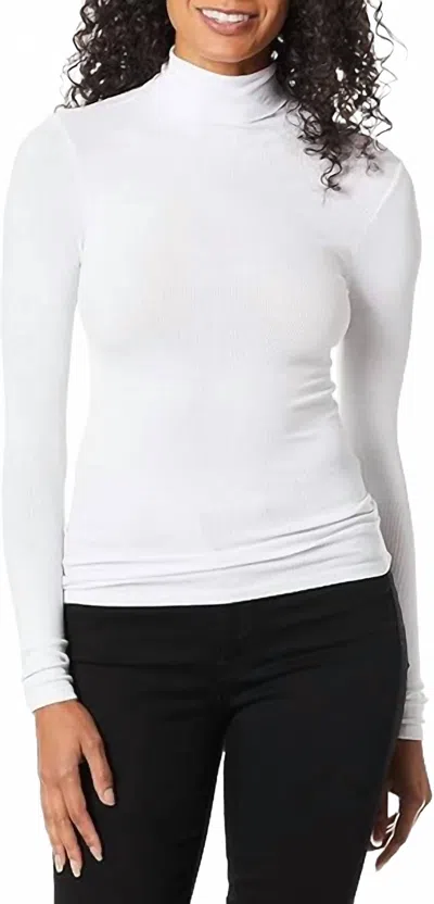 Enza Costa Rib Fitted Long Sleeve Turtleneck Top In White
