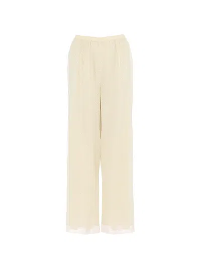 Eres Translucide Lace-trim Trousers In Neutral