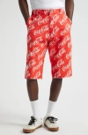 ERL X COCA-COLA RIPPED CANVAS BERMUDA SHORTS