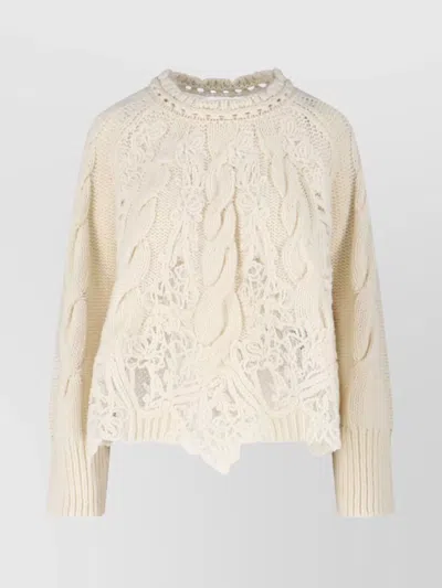 ERMANNO SCERVINO KNITWEAR WITH CREWNECK AND ASYMMETRIC HEM