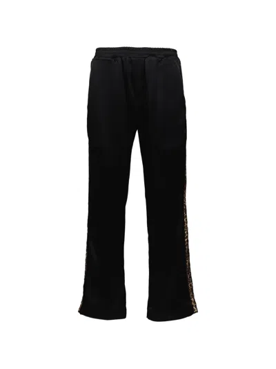 Ernest W Baker Leopard-stripe Track Pants In Black