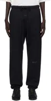 Essentials Mens Jet Black Vintage Logo-embellished Cotton-blend Jogging Bottoms In Gold