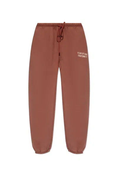 Essentials Emblem Printed Track Pants In Red