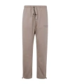 Essentials Embossed Logo Tracksuit Pants In Brown