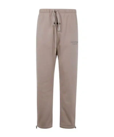Essentials Embossed Logo Tracksuit Pants In Brown