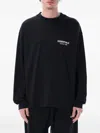 Essentials Logo-print Long-sleeve T-shirt In Black