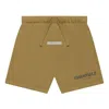 Essentials Fear Of God  Fw21 Logo Sweatshort 'amber' In Gold