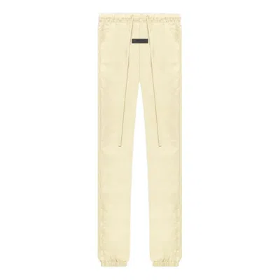 ESSENTIALS FEAR OF GOD ESSENTIALS FW22 TRACK PANT CANARY