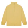 Essentials Fear Of God  Ss23 Filled Nylon Jacket 'light Tuscan' In Yellow